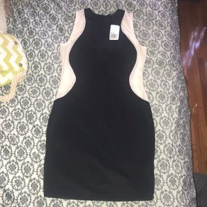 Forever 21 body-con dress. Black and nude. Size S